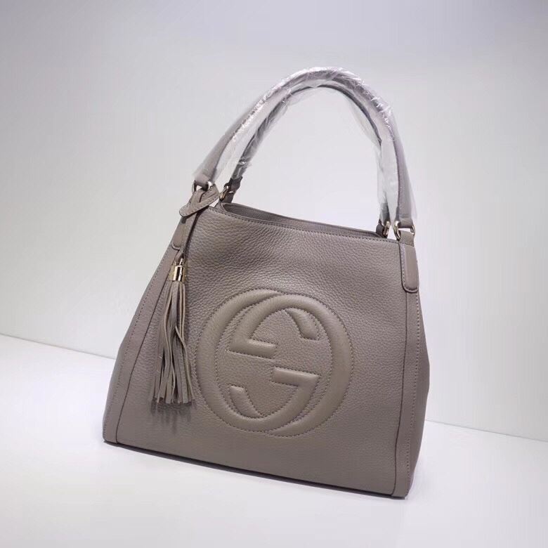 G*u*i top handle bags
